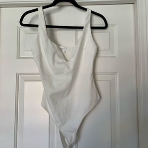 “by the way” white onesie